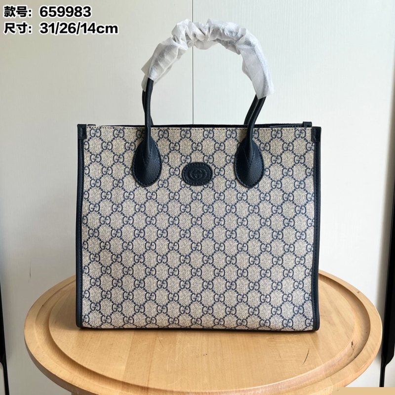 G*u*i shopping bags